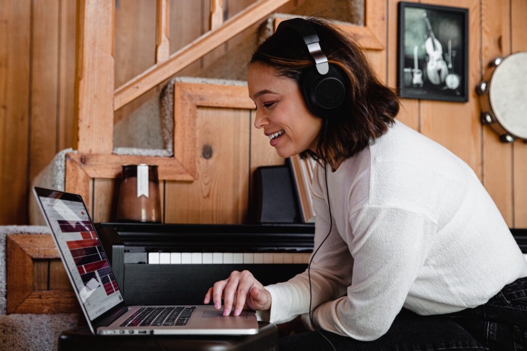 This image shows a women talking to a computer 