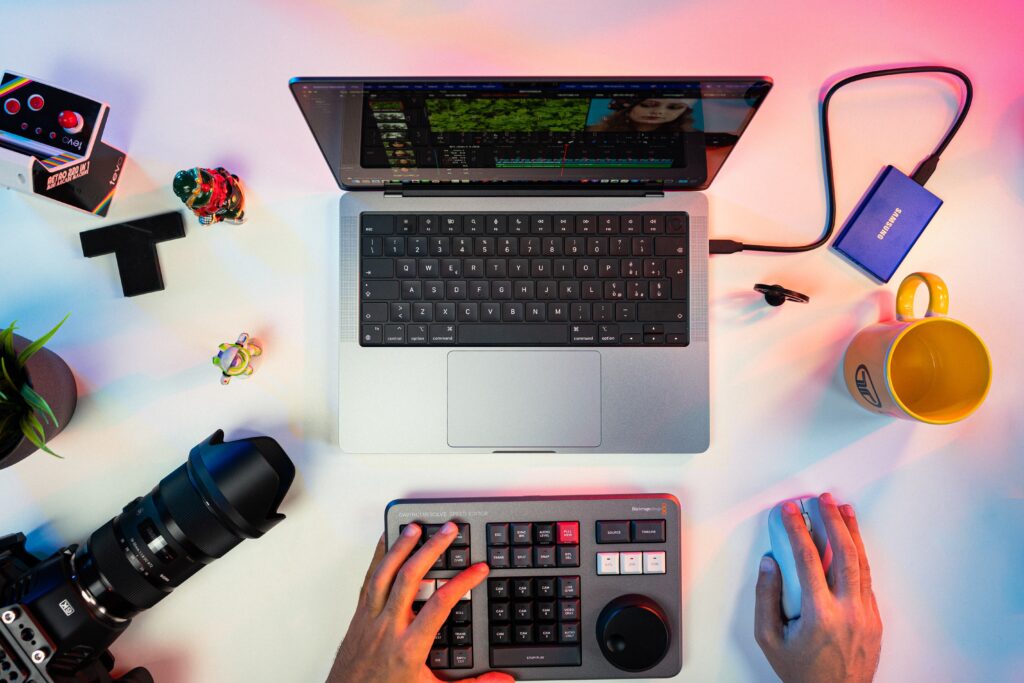 This is an image showing a person editing a video on computer